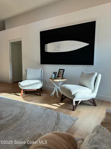 a bedroom with a bed and a table