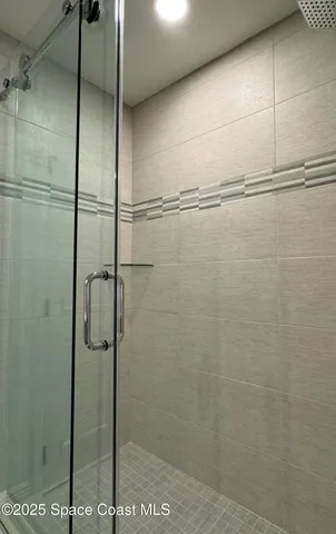 a view of a swimming pool with an outdoor seating