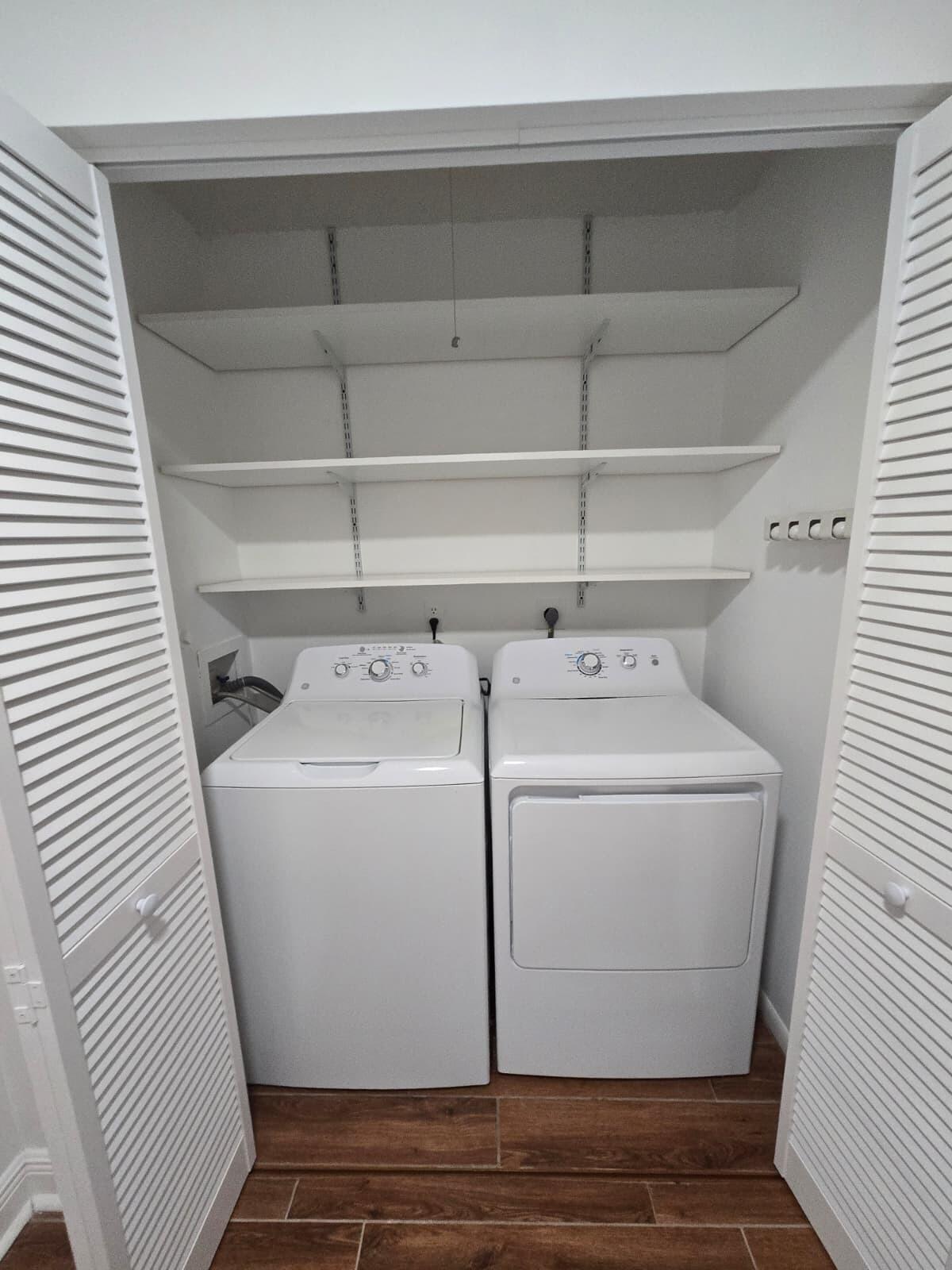 14103 Nesting Way, Unit C Delray Beach, FL 33484 - Photo 13 of 36 laundry closet