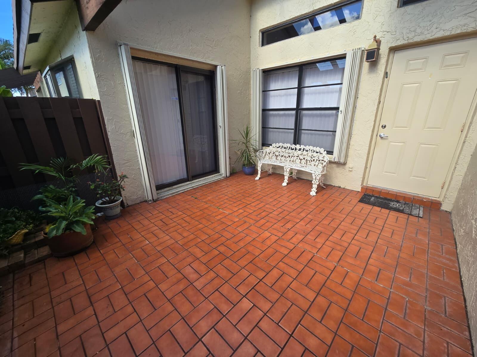 14103 Nesting Way, Unit C Delray Beach, FL 33484 - Photo 2 of 36 patio