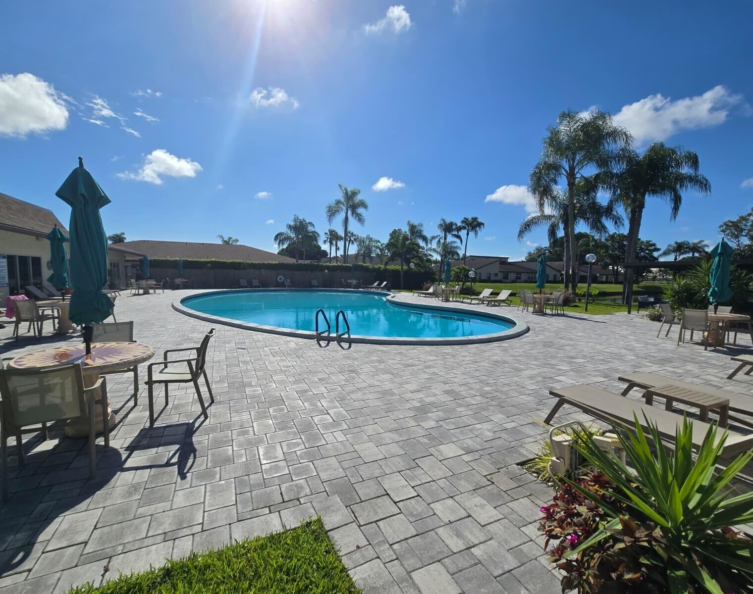 14103 Nesting Way, Unit C Delray Beach, FL 33484 - Photo 34 of 36 pool view