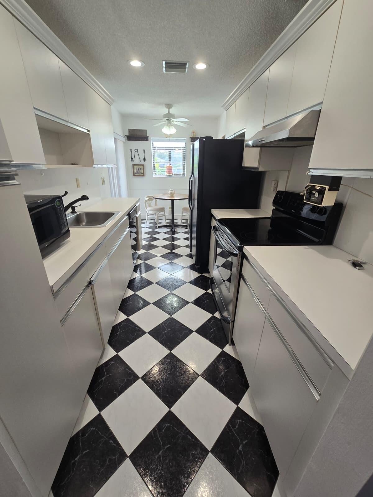 14103 Nesting Way, Unit C Delray Beach, FL 33484 - Photo 7 of 36 kitchen