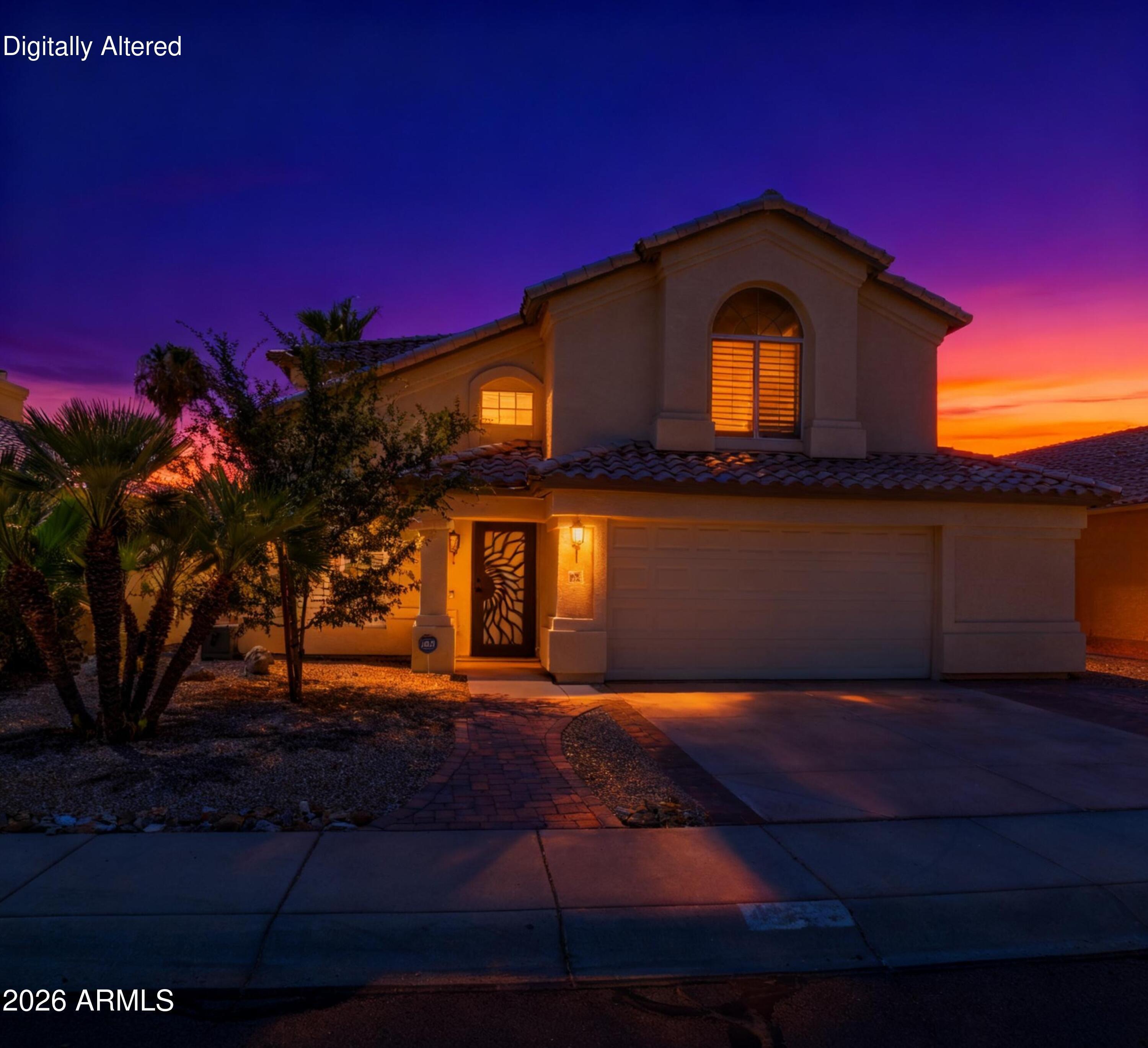 4409 East Dry Creek Road Phoenix, AZ 85044 - Photo 2 of 34 a front view of a house with a yard