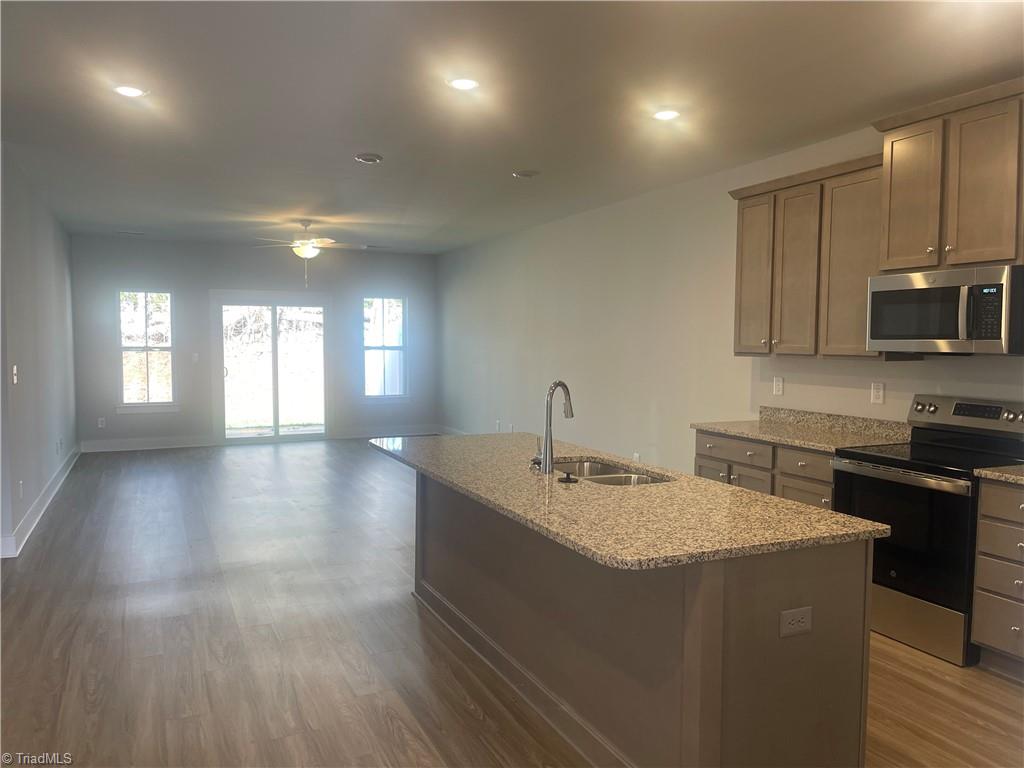 7329 Dew Sharpe Road Gibsonville, NC 27249 - Photo 9 of 15 this unit is at 217 Cason i with graite counters