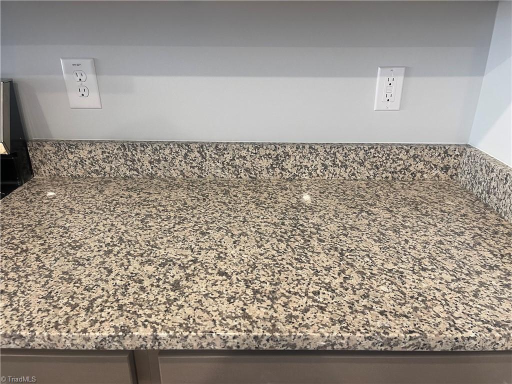 7329 Dew Sharpe Road Gibsonville, NC 27249 - Photo 10 of 15 granite counter at 217 Cason Dr