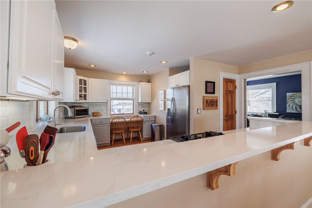 2273 Edgemere Drive Greece, NY 14612 - Photo 31 of 50 Overhang for quick meals on the go.