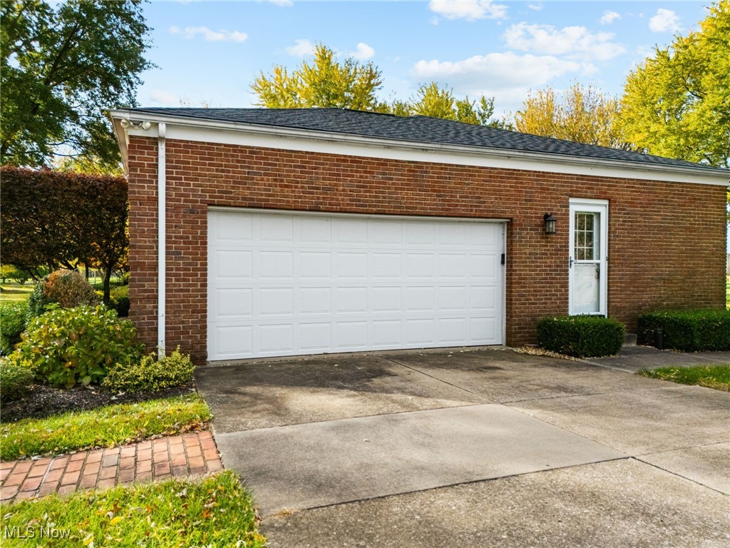 14265 Reeder Avenue Northeast Alliance, OH 44601 - Photo 26 of 39 Garage with concrete driveway