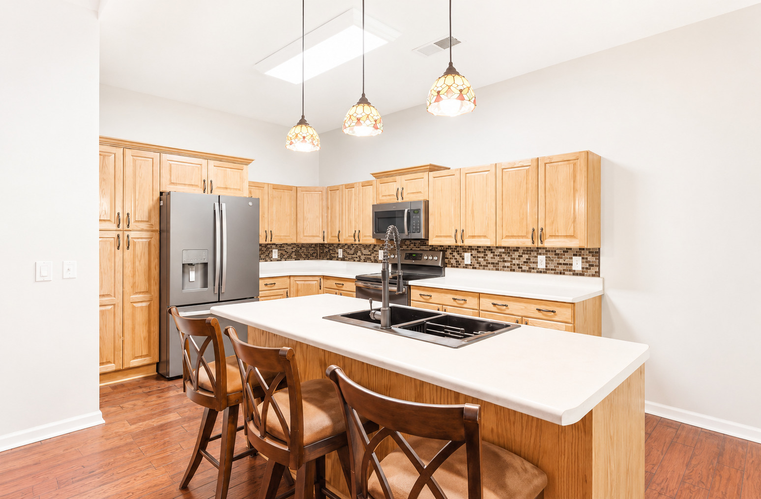1002 2nd St Court Moline, IL 61265 - Photo 13 of 31 a kitchen with a table and chairs in it