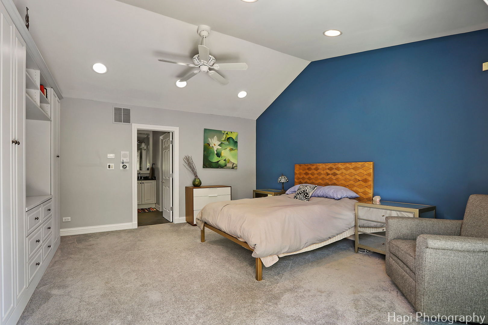 1340 North Sutton Place Chicago, IL 60610 - Photo 14 of 40 a bedroom with a bed couch chandelier and a window