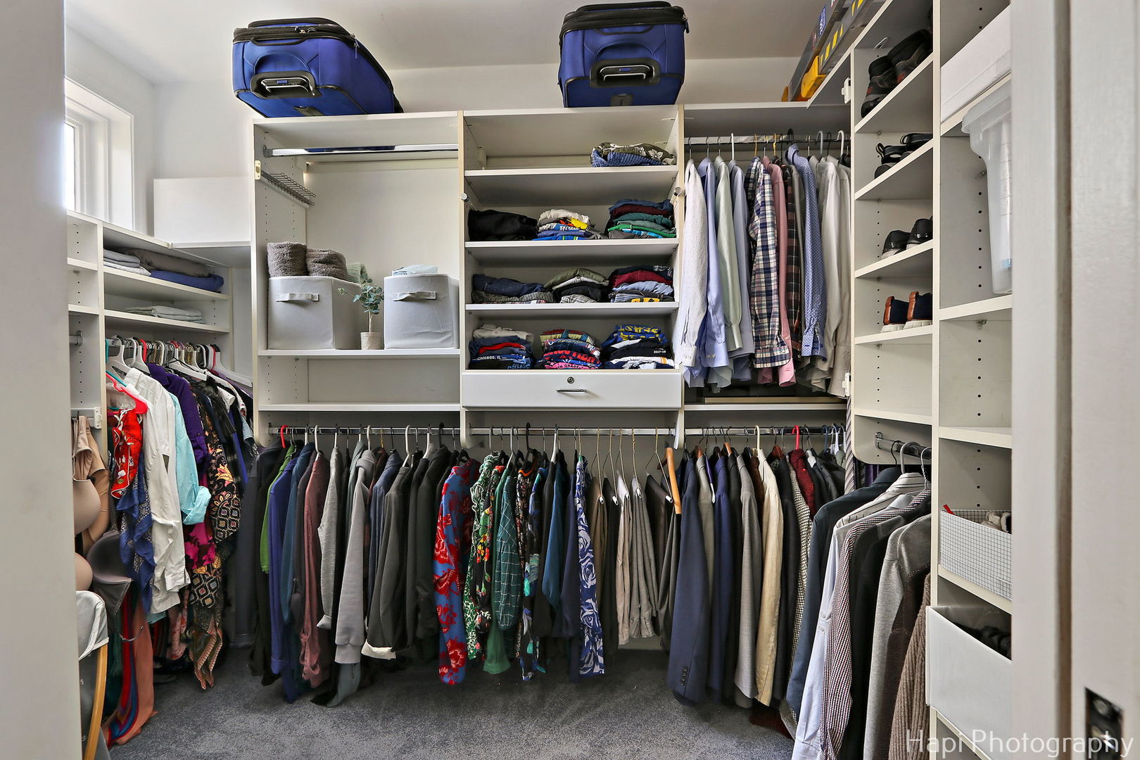 1340 North Sutton Place Chicago, IL 60610 - Photo 19 of 40 a view of walk in closet with clothes and shoes