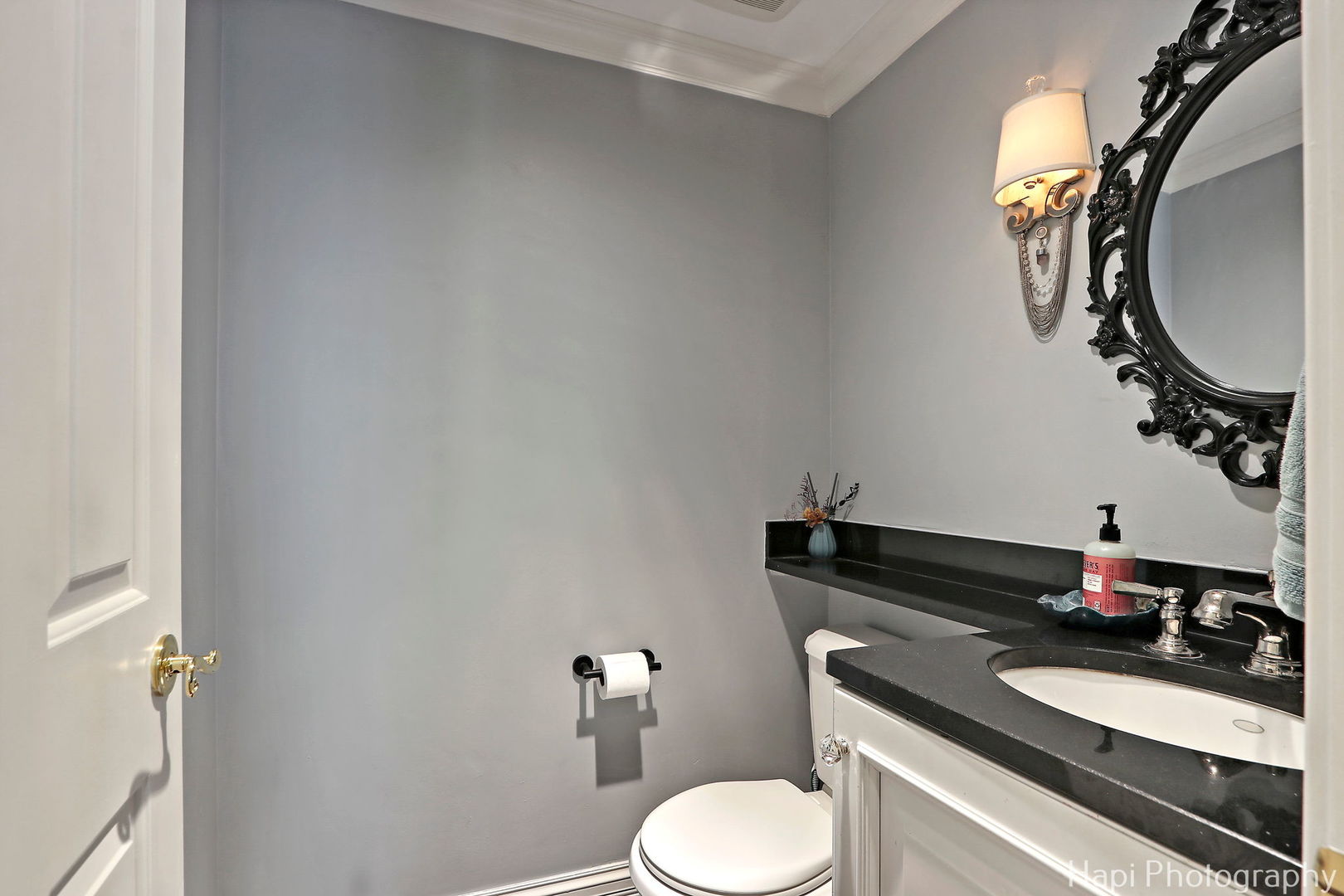 1340 North Sutton Place Chicago, IL 60610 - Photo 30 of 40 a bathroom with a sink and a mirror