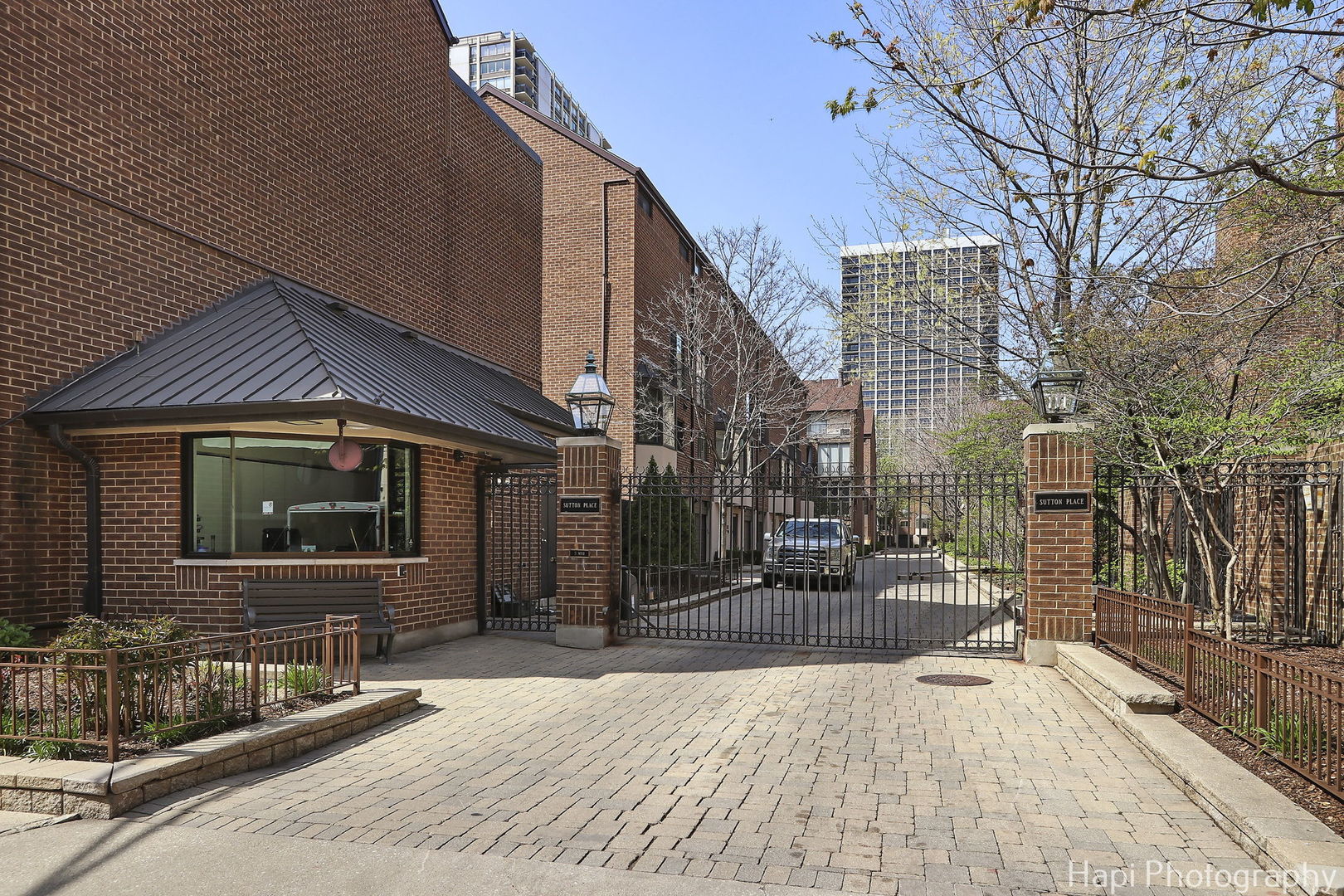 1340 North Sutton Place Chicago, IL 60610 - Photo 36 of 40 a front view of a house with a yard