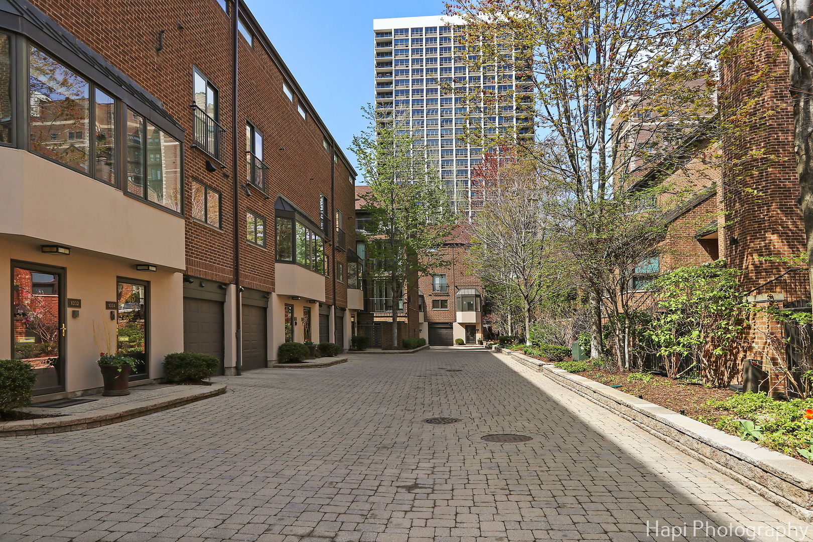 1340 North Sutton Place Chicago, IL 60610 - Photo 39 of 40 a street view with large building