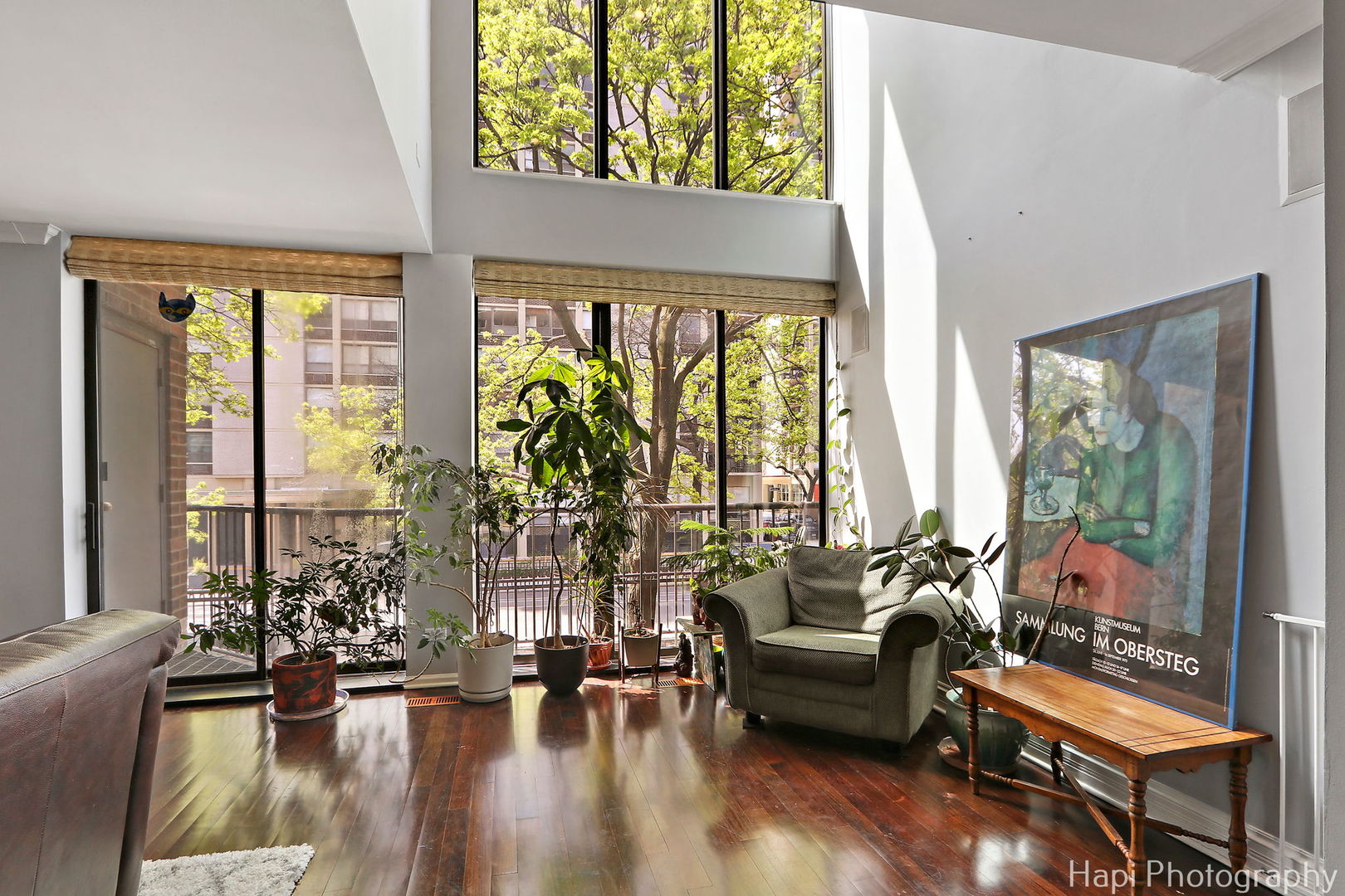 1340 North Sutton Place Chicago, IL 60610 - Photo 4 of 40 a living room with furniture and a large window