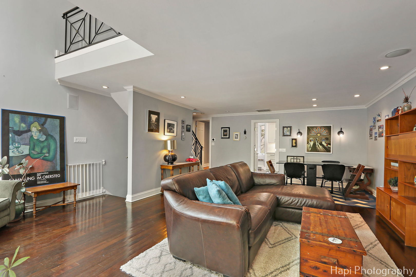 1340 North Sutton Place Chicago, IL 60610 - Photo 6 of 40 a living room with furniture and a flat screen tv
