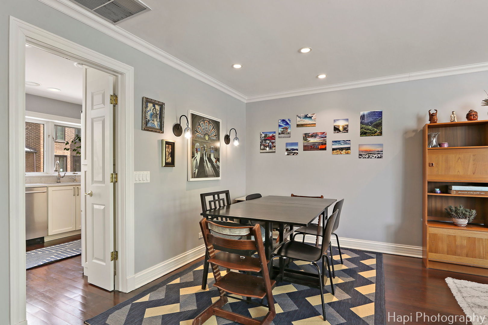 1340 North Sutton Place Chicago, IL 60610 - Photo 7 of 40 a view of a dining room with furniture and wooden floor