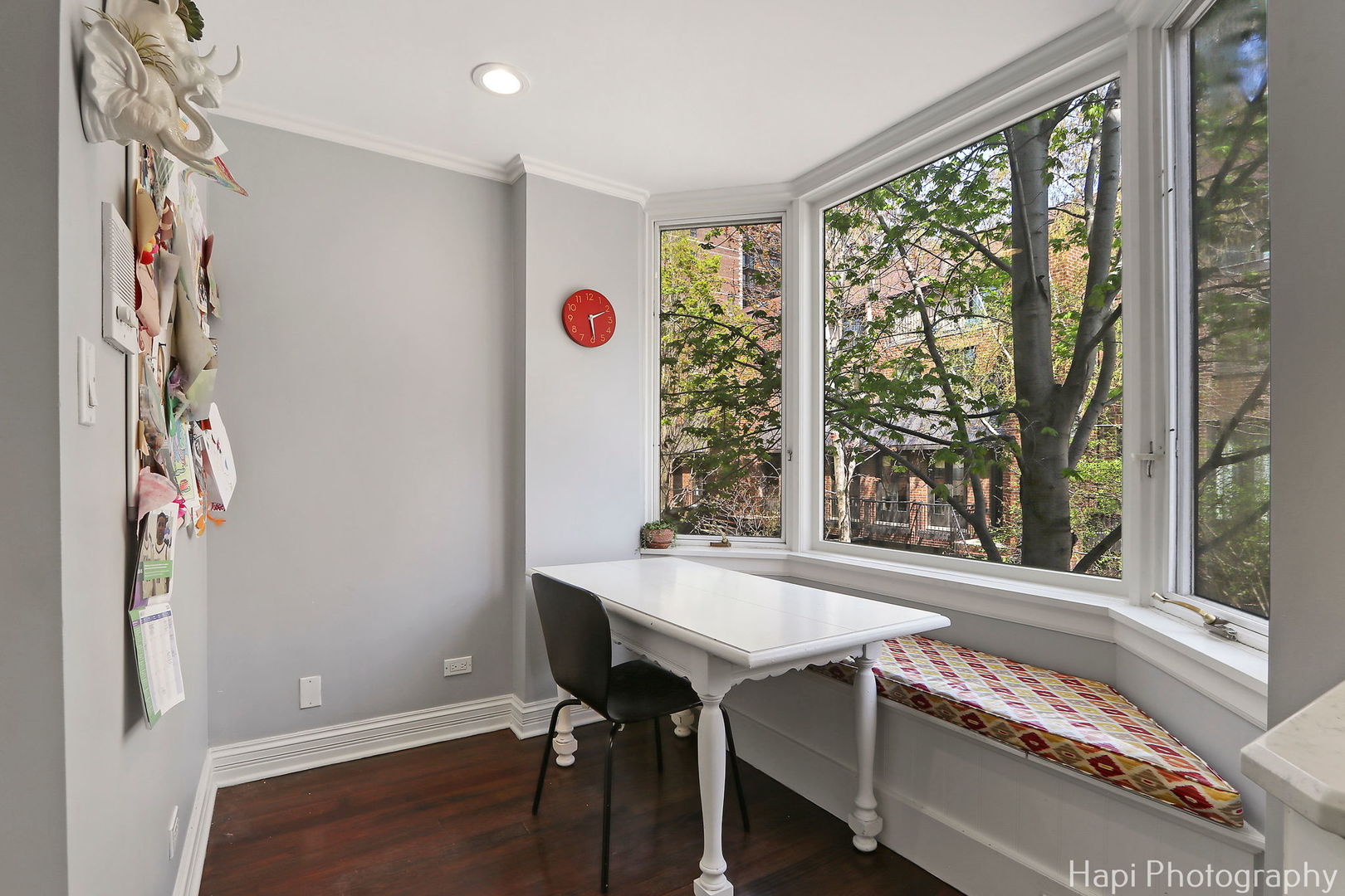 1340 North Sutton Place Chicago, IL 60610 - Photo 10 of 40 a view of a dining room with furniture and a window