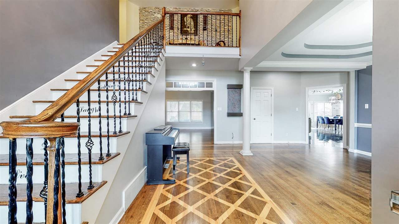 419 Military Road Collierville, TN 38017 - Photo 2 of 25 a view of an entryway with wooden floor and a table