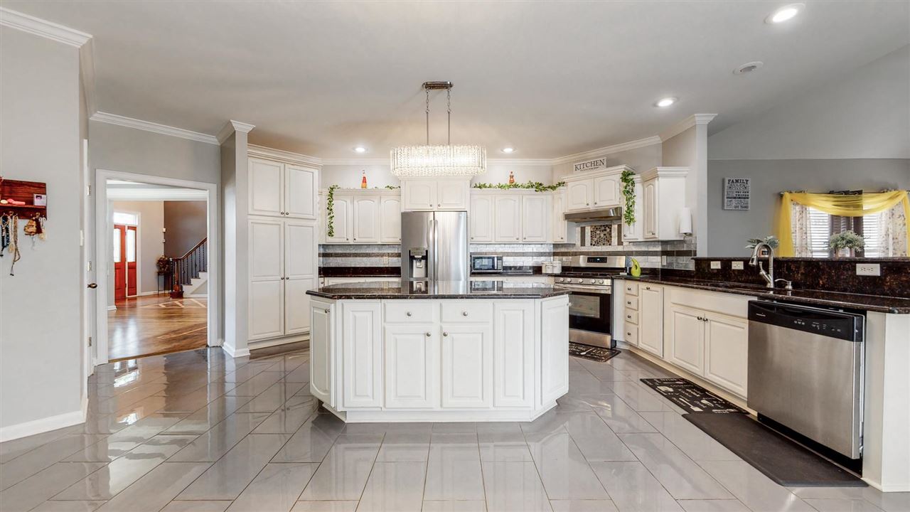 419 Military Road Collierville, TN 38017 - Photo 15 of 25 a kitchen with stainless steel appliances a refrigerator sink and cabinets