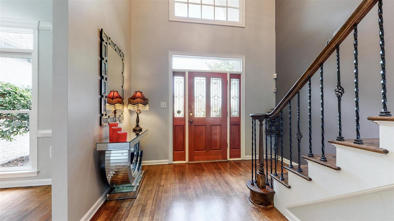 419 Military Road Collierville, TN 38017 - Photo 3 of 25 a view of front door with wooden floor and stairs