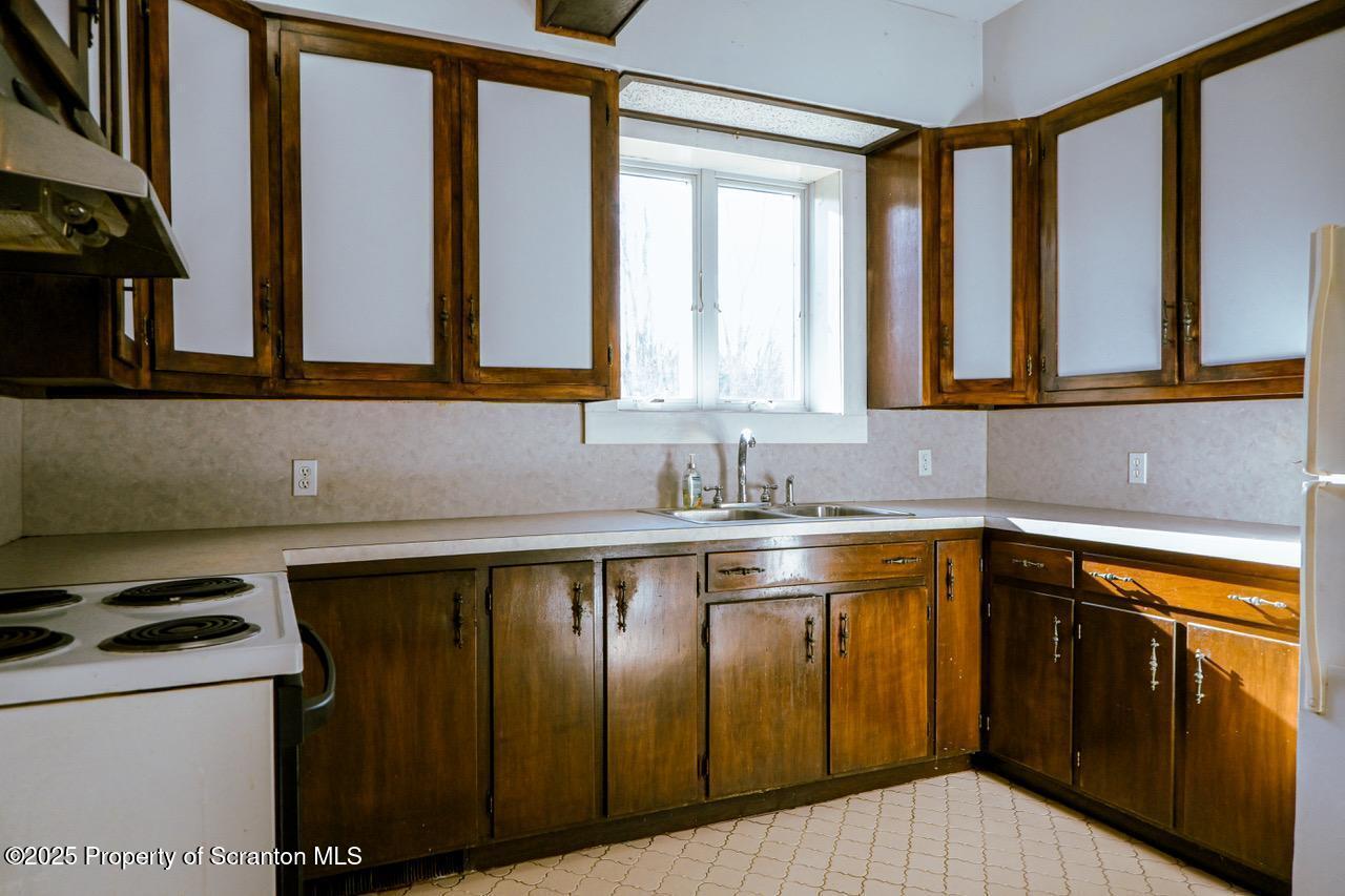 211 Wimmers Road Lake Ariel, PA 18436 - Photo 15 of 65 a kitchen with a sink and a window