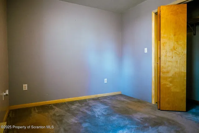 a bathroom with a tub and shower