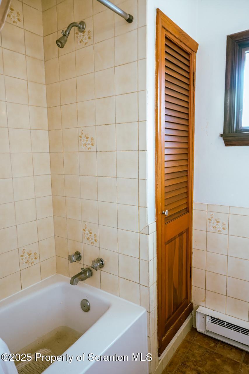 211 Wimmers Road Lake Ariel, PA 18436 - Photo 61 of 65 a bathroom with a tub and shower