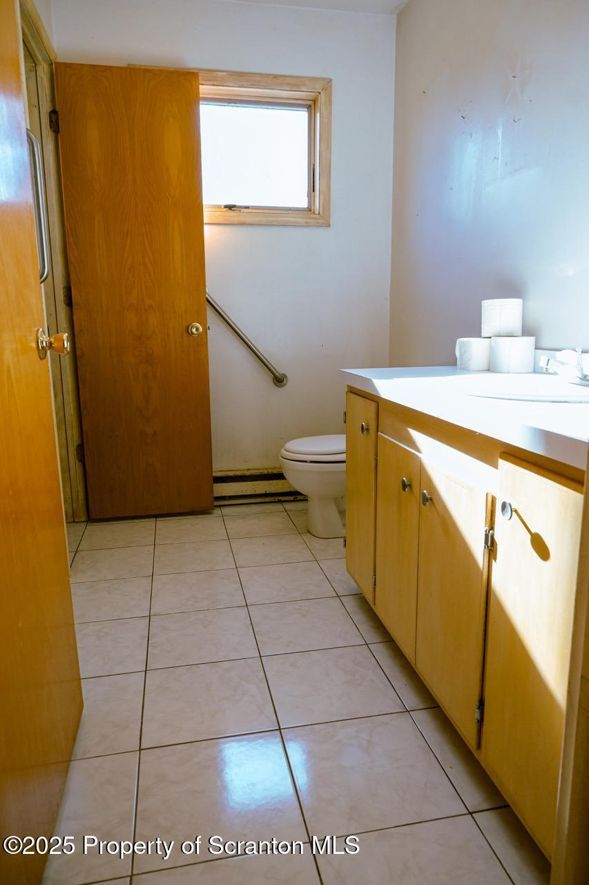 211 Wimmers Road Lake Ariel, PA 18436 - Photo 63 of 65 a bathroom with a sink a toilet and a shower