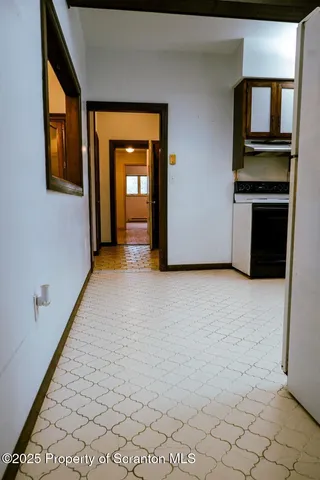 a view of a kitchen with an entryway