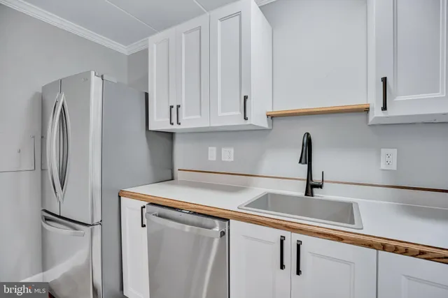 a kitchen with appliances and cabinets