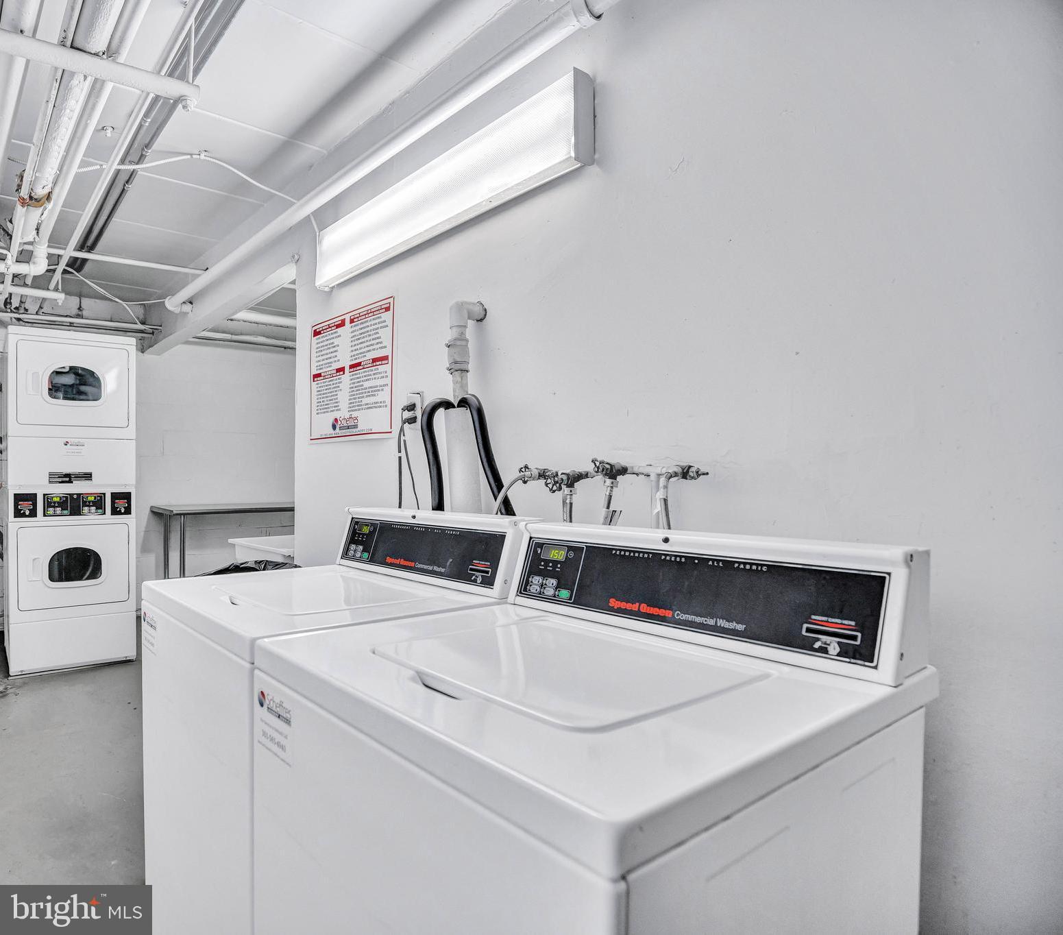 2605 Fort Farnsworth Road, Unit 314 Alexandria, VA 22303 - Photo 22 of 34 a utility room with dryer and washer