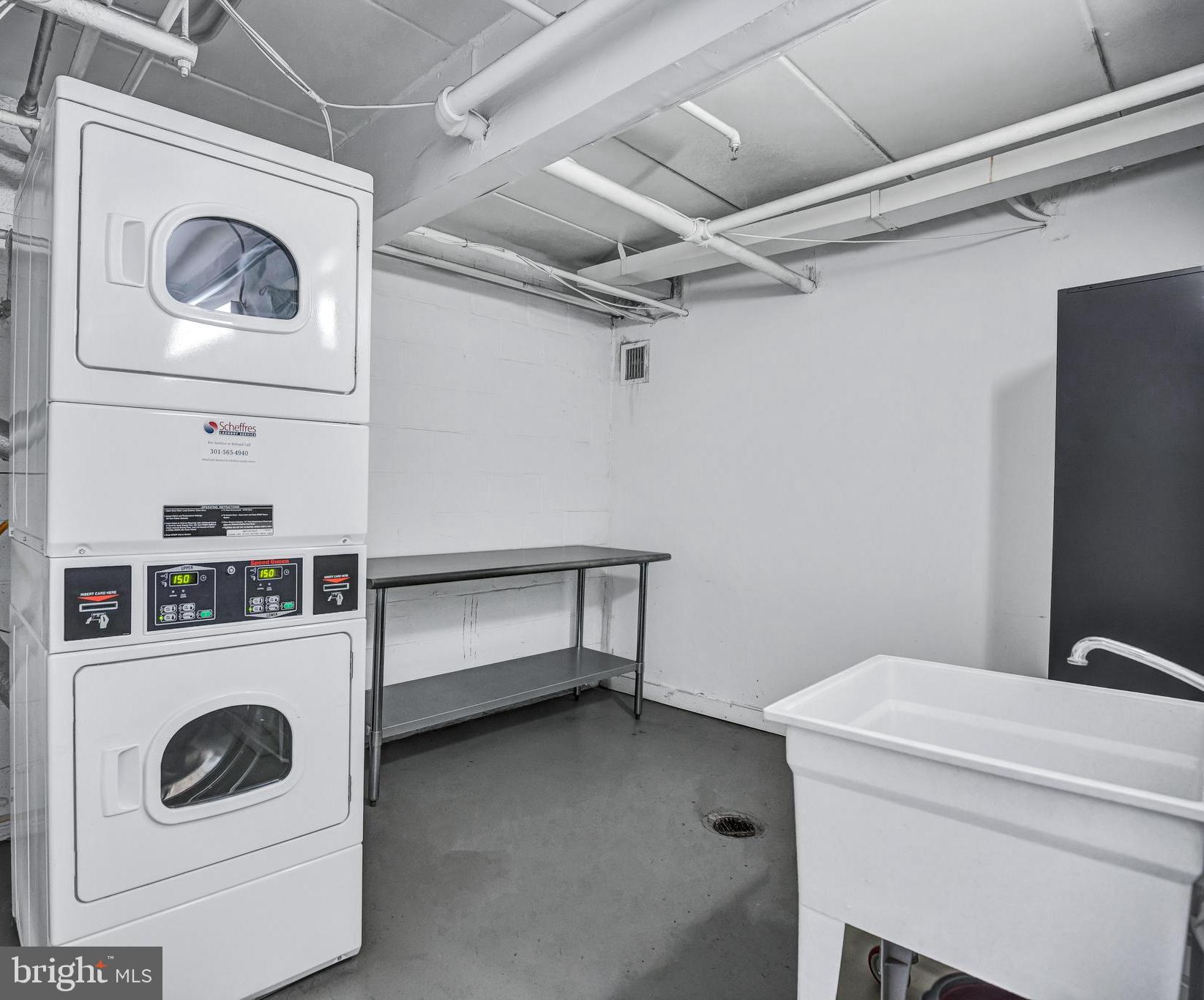 2605 Fort Farnsworth Road, Unit 314 Alexandria, VA 22303 - Photo 23 of 34 a utility room with dryer and washer