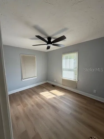 a view of an empty room with a window