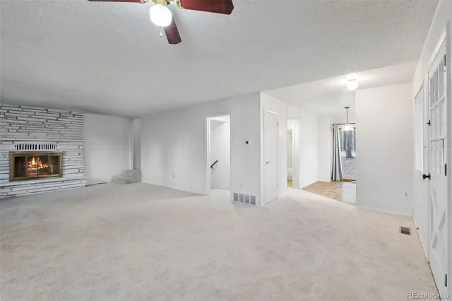 a view of a livingroom with a fireplace
