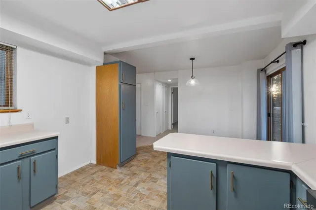 a bathroom with a sink a mirror and a shower