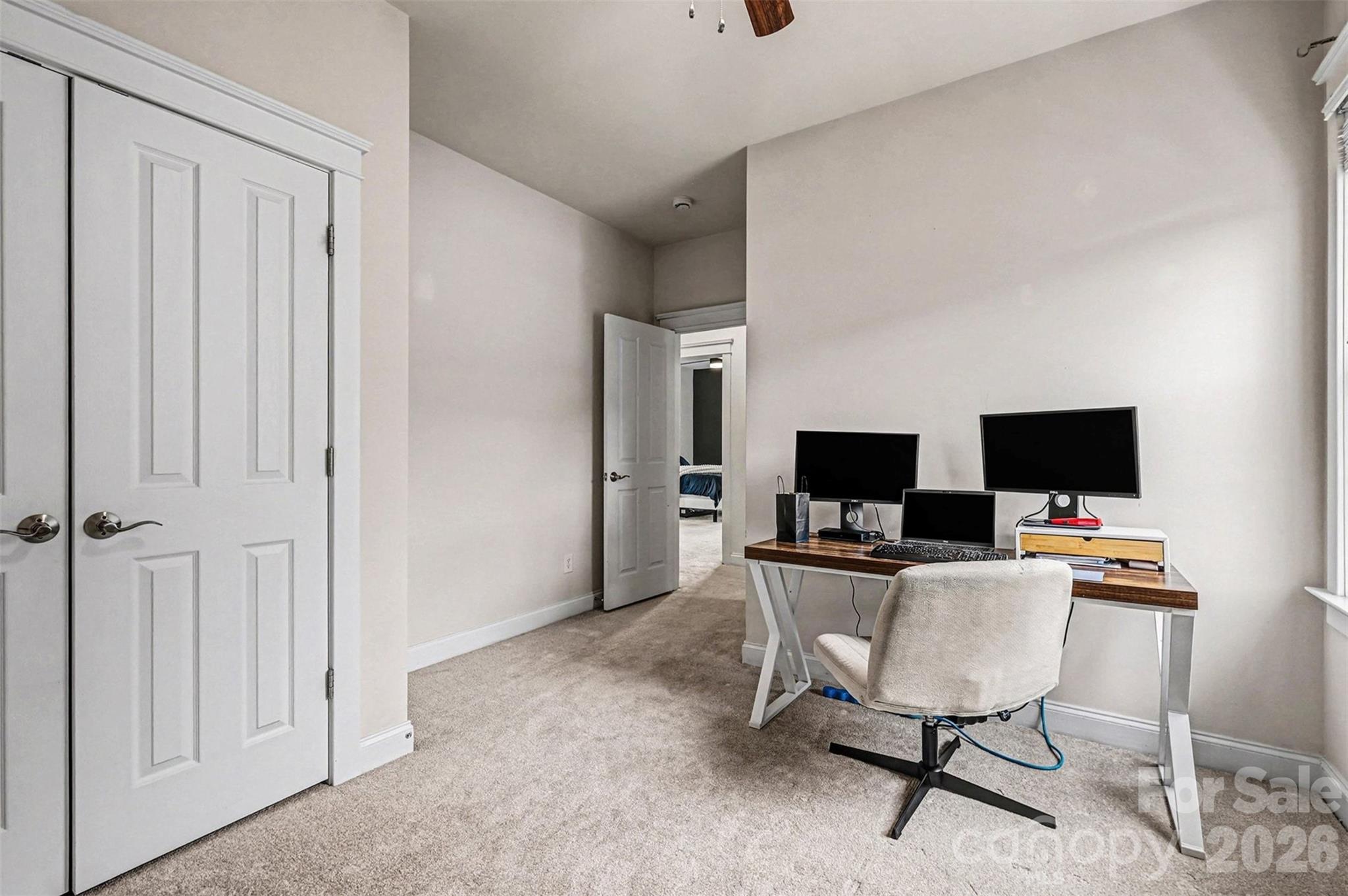 191 Lilac Mist Loop Mooresville, NC 28115 - Photo 28 of 44 a workspace with furniture and a flat screen tv