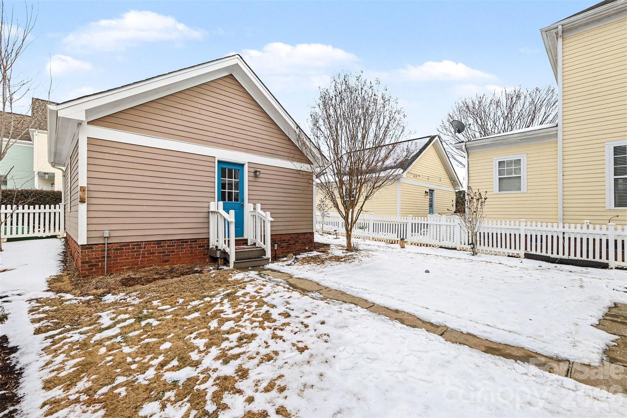 191 Lilac Mist Loop Mooresville, NC 28115 - Photo 32 of 44 a view of a house with a patio