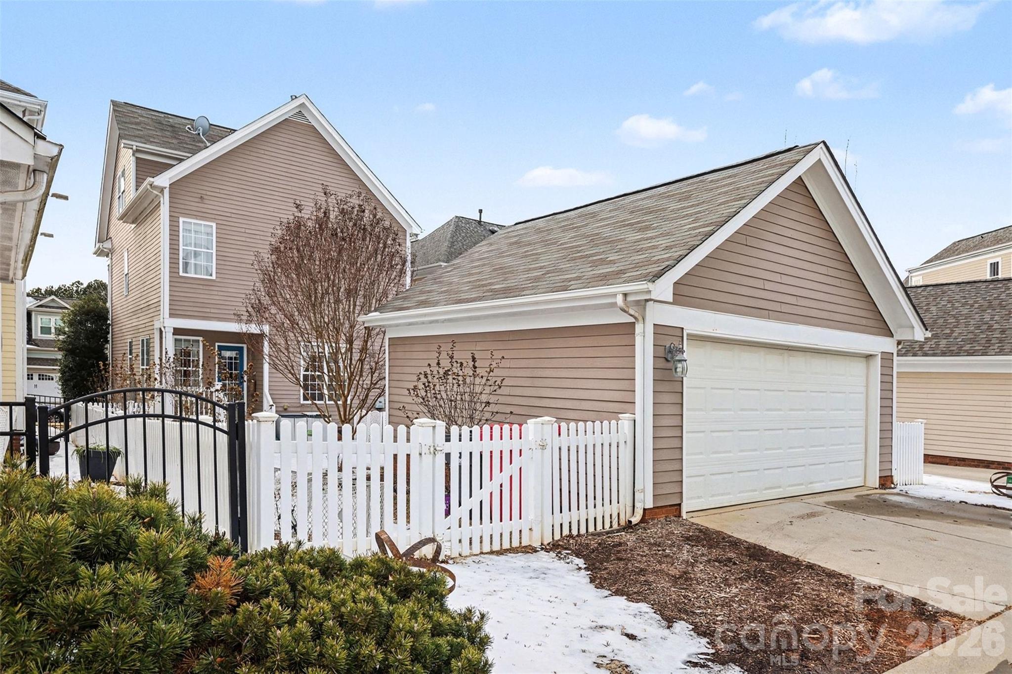 191 Lilac Mist Loop Mooresville, NC 28115 - Photo 34 of 44 a front view of a house with a yard