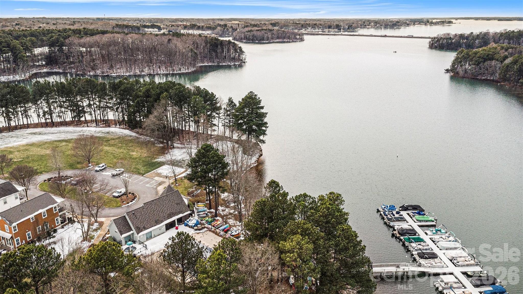 191 Lilac Mist Loop Mooresville, NC 28115 - Photo 39 of 44 an aerial view of residential houses with outdoor space and swimming pool