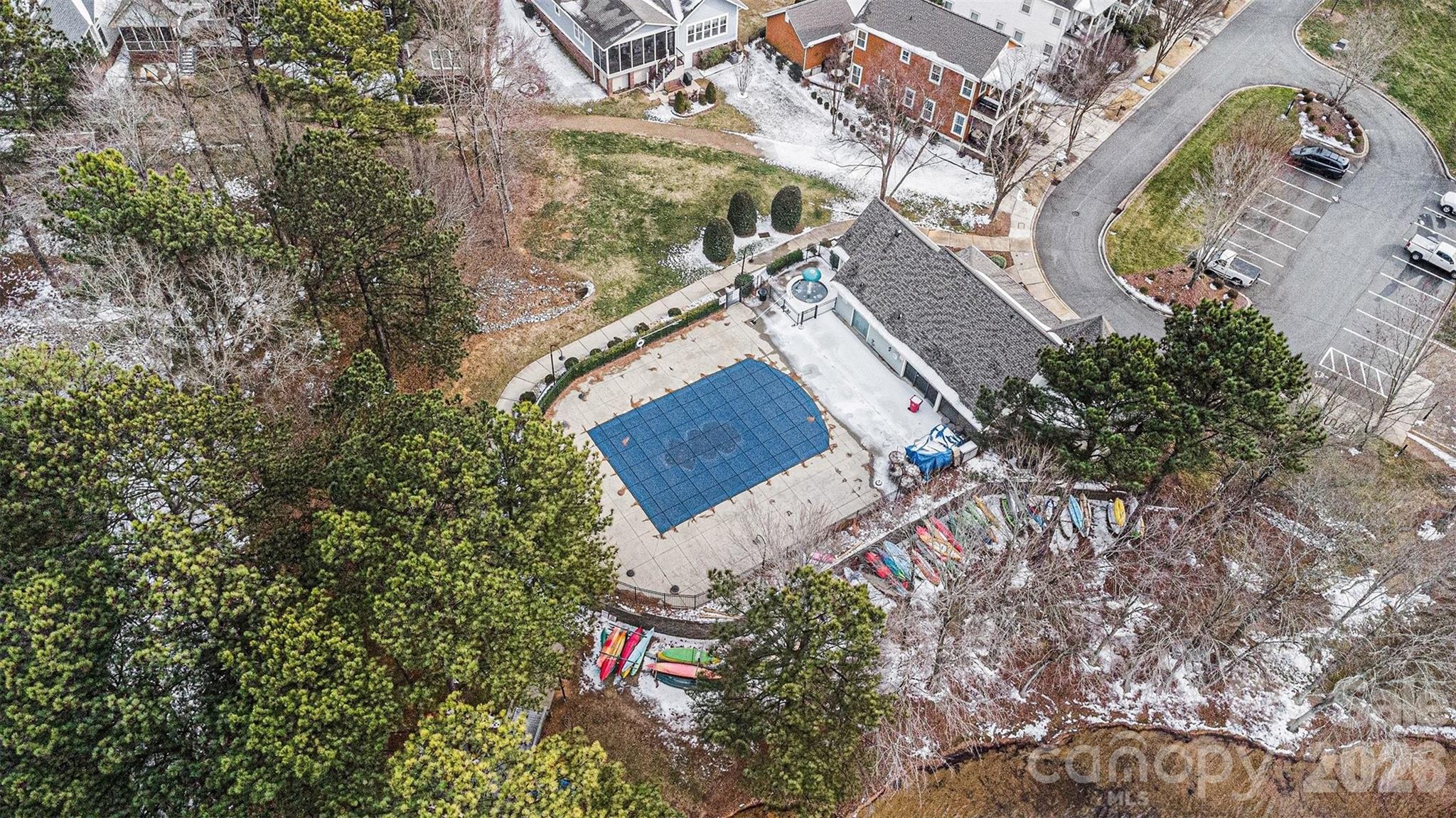 191 Lilac Mist Loop Mooresville, NC 28115 - Photo 40 of 44 an aerial view of a house with a yard and wooden fence