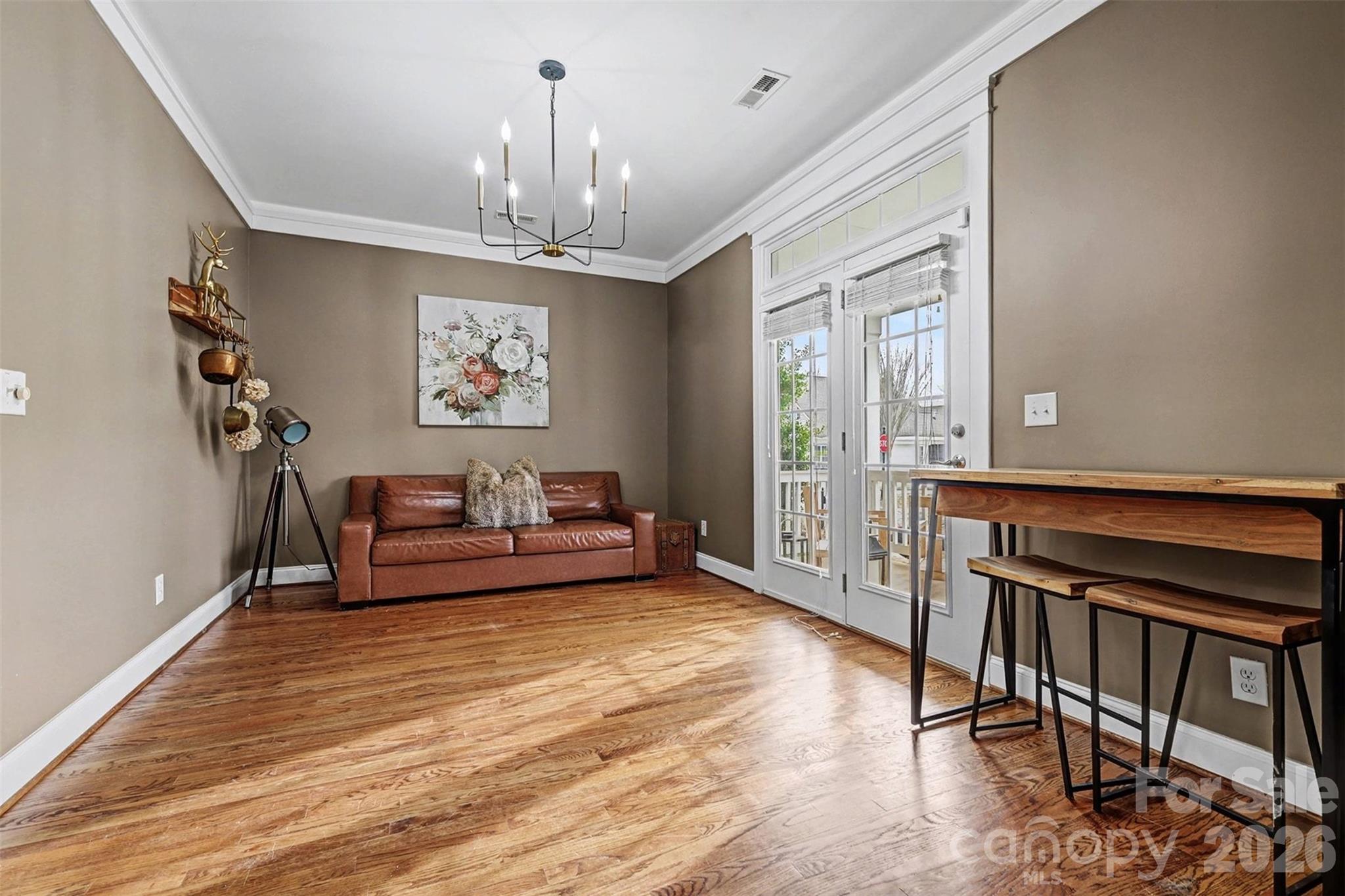191 Lilac Mist Loop Mooresville, NC 28115 - Photo 7 of 44 a view of a livingroom with furniture window and wooden floor
