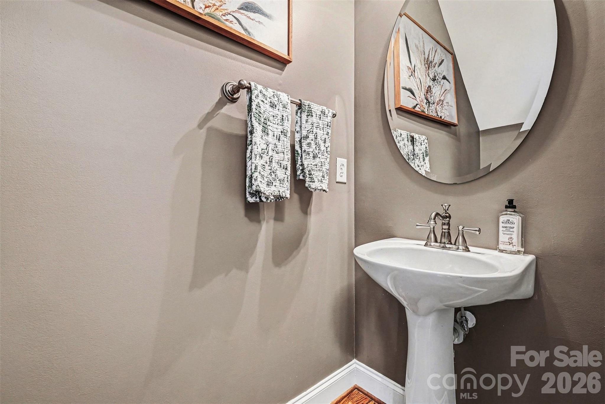 191 Lilac Mist Loop Mooresville, NC 28115 - Photo 9 of 44 a bathroom with a sink and a mirror