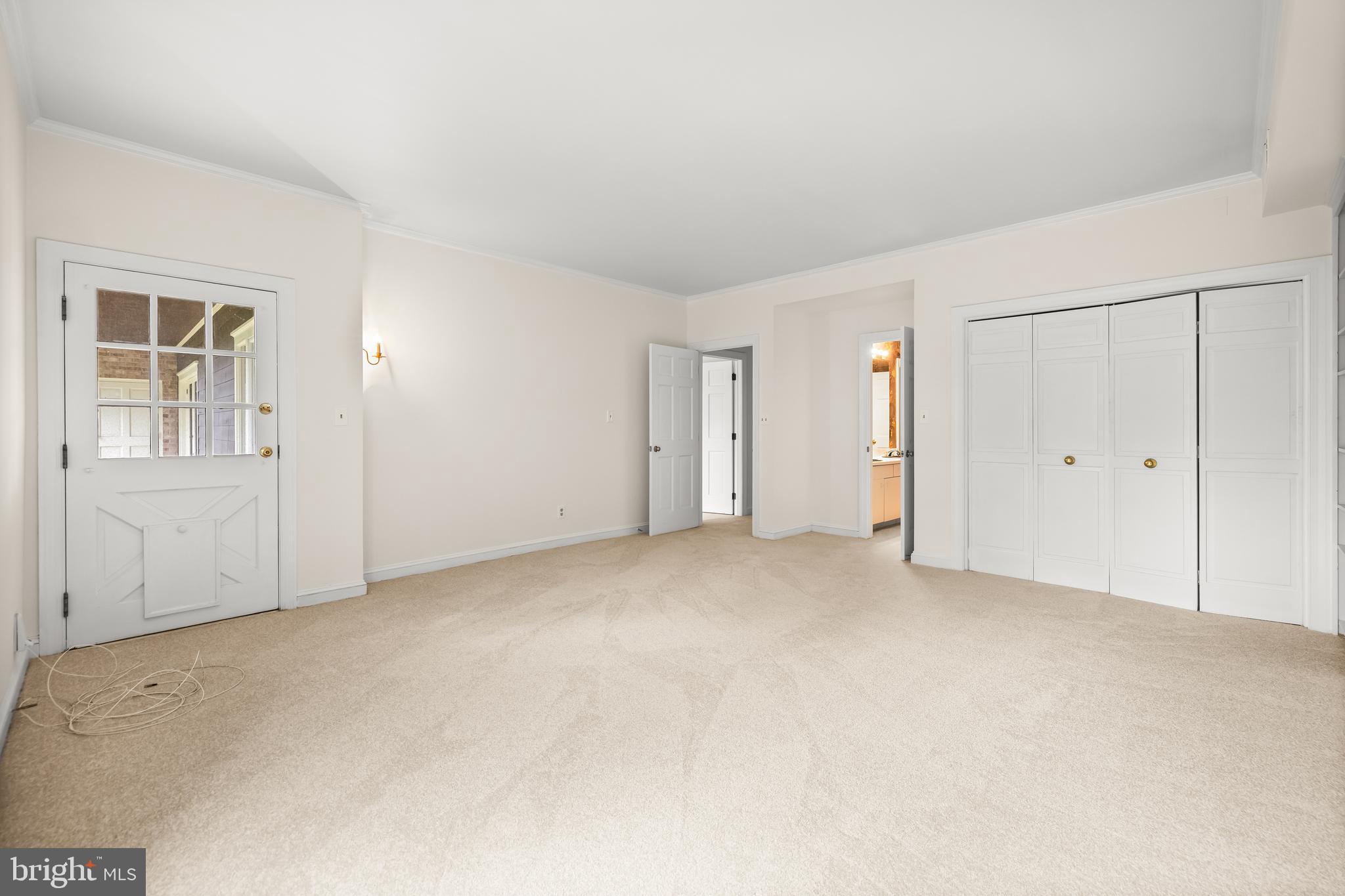 7 Devon Hill Road, Unit A4 Baltimore, MD 21210 - Photo 24 of 30 an empty room with windows and closet