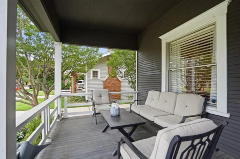 a outdoor living space with furniture and garden view