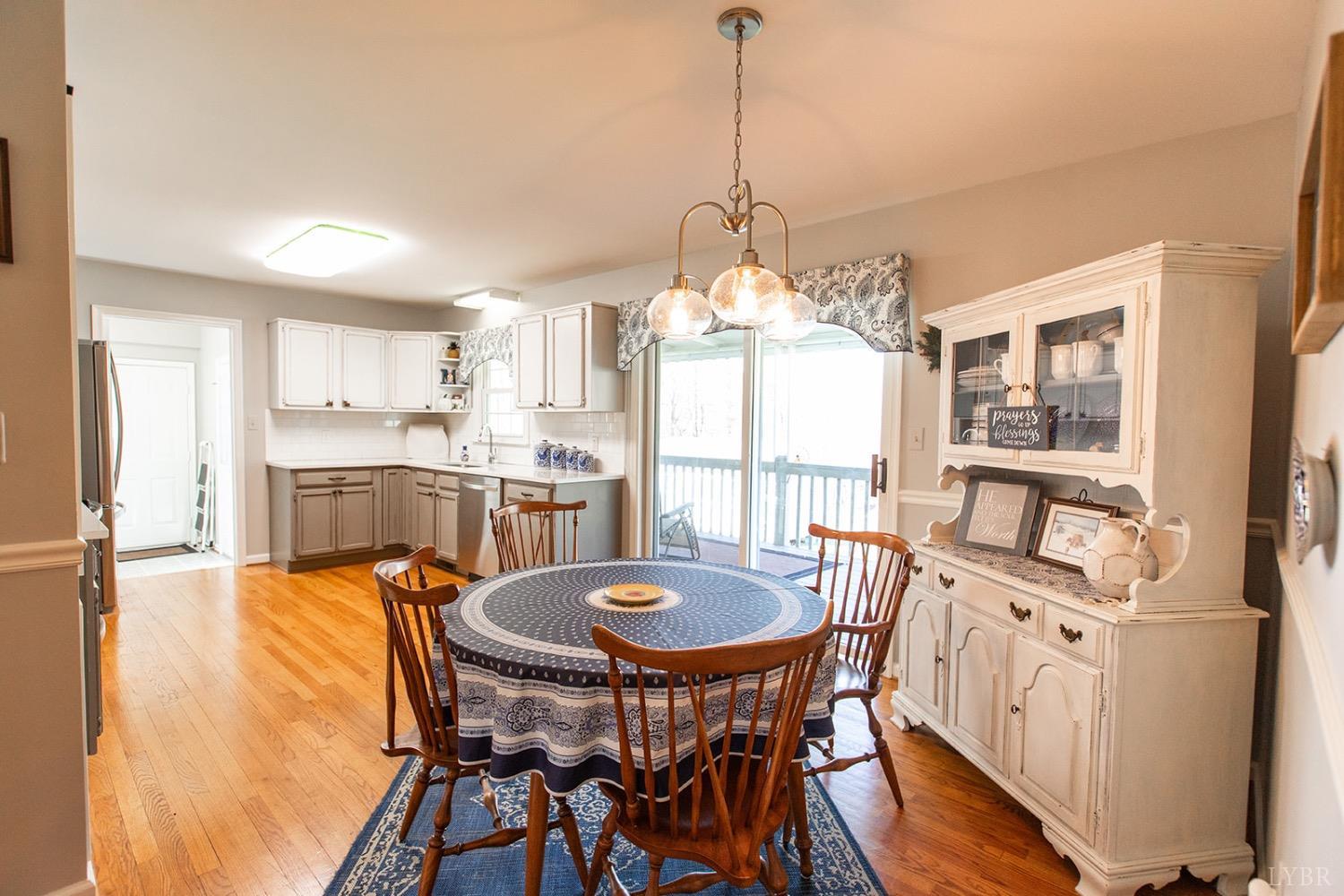 115 Hunters Creek Road Forest, VA 24551 - Photo 13 of 43 a view of a dining room with furniture window and outside view