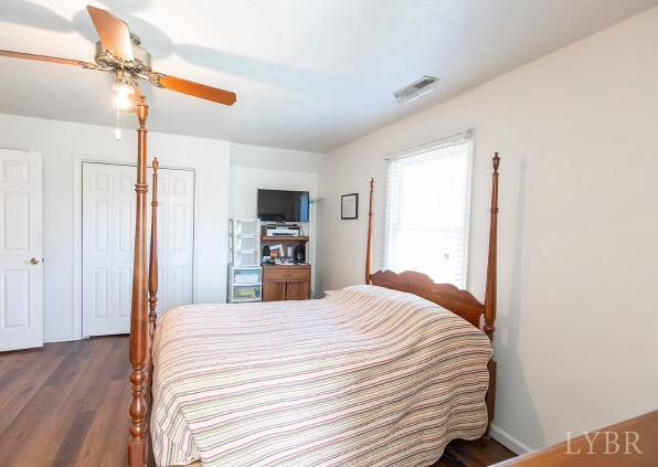 115 Hunters Creek Road Forest, VA 24551 - Photo 24 of 43 a bedroom with a bed and a view of kitchen
