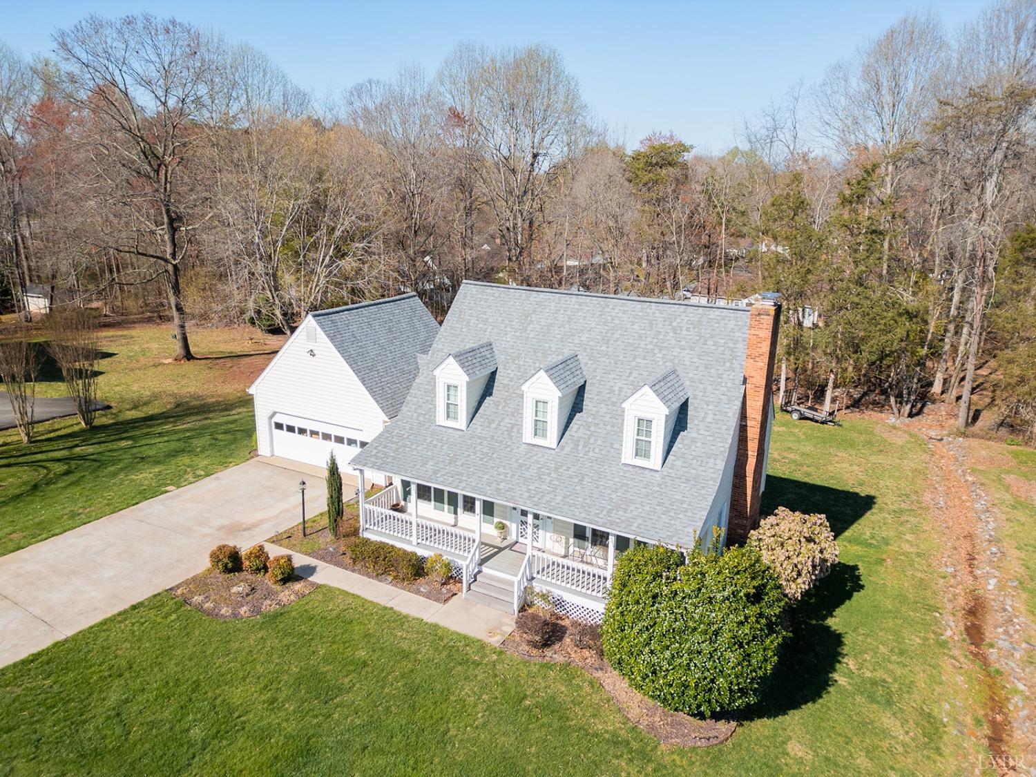 115 Hunters Creek Road Forest, VA 24551 - Photo 39 of 43 a front view of a house with garden