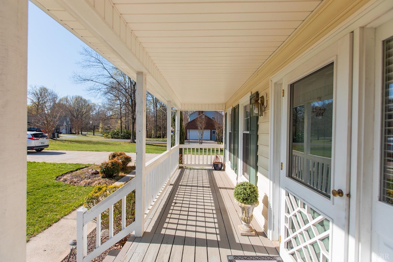 115 Hunters Creek Road Forest, VA 24551 - Photo 4 of 43 a view of a balcony with yard