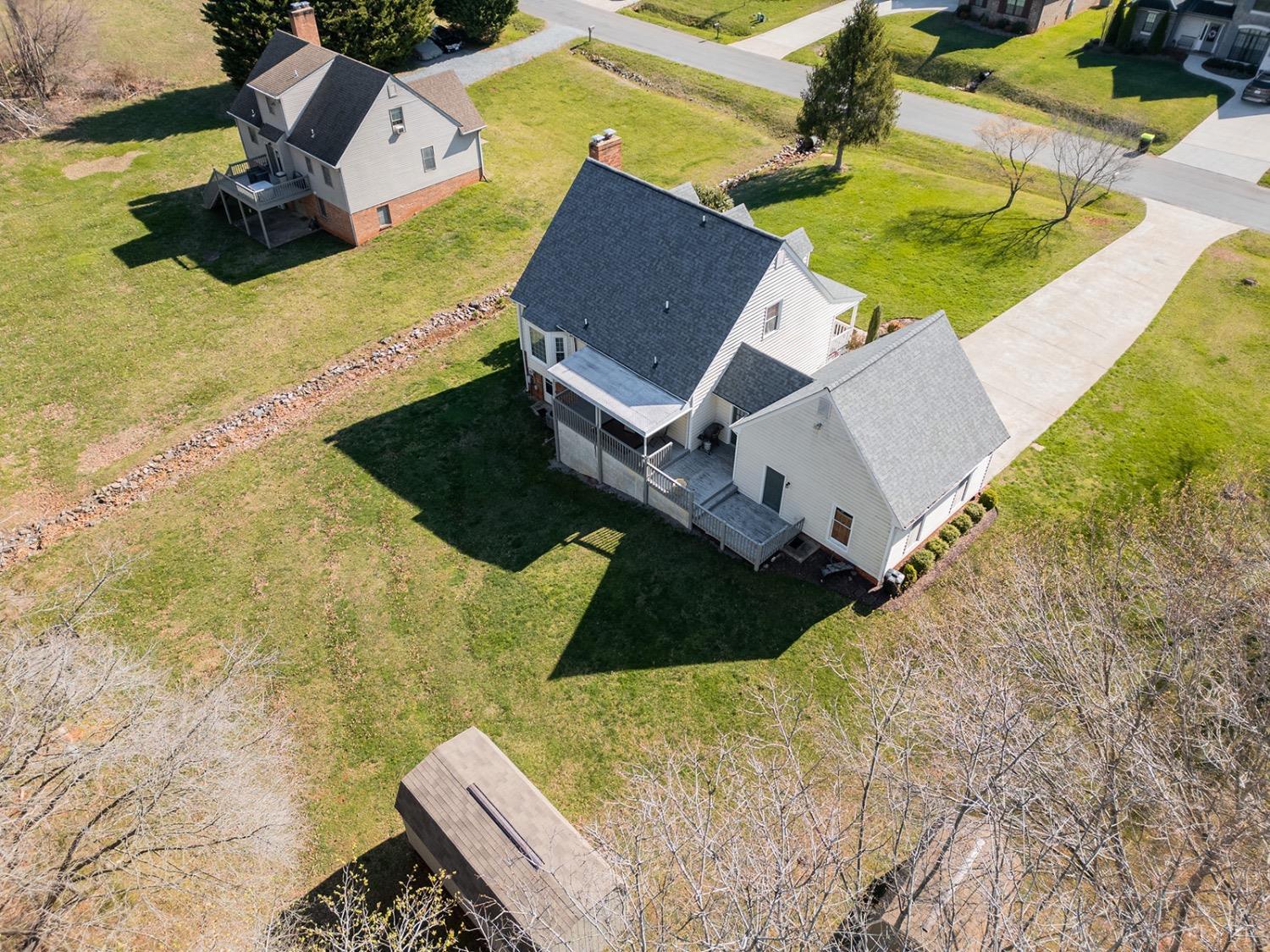 115 Hunters Creek Road Forest, VA 24551 - Photo 41 of 43 an aerial view of a house with a yard and trees