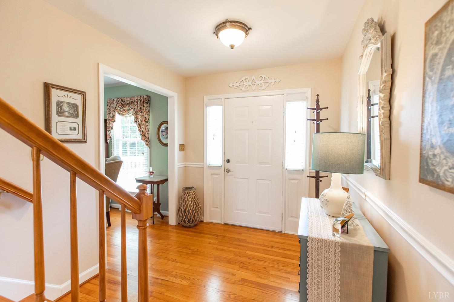 115 Hunters Creek Road Forest, VA 24551 - Photo 5 of 43 a view of an entryway with wooden floor and livingroom view